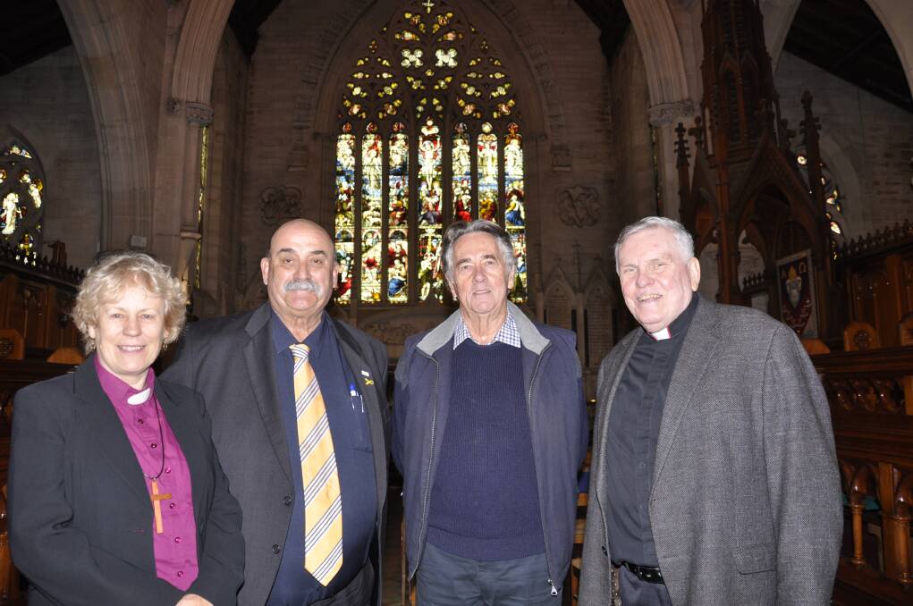 MAJOR WORK: Bishop Carol Wagner, Mayor Peter Walker, heritage architect Michael Fox and Saint Saviour's Dean Phillip Saunders at Saturday's funding announcement for the Cathedral's Great Eastern window (behind). Photo: Louise Thrower. 