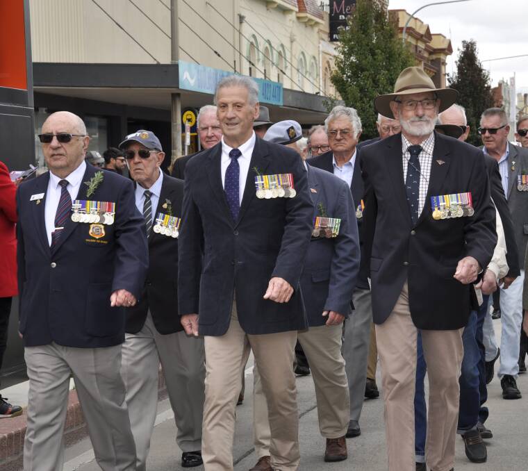 Vietnam War veterans including Goulburn RSL Sub Branch president Mal Ritichie (left) were among those who marched at the city's 2022 Anzac Day commemorations. Photo: Louise Thrower.
