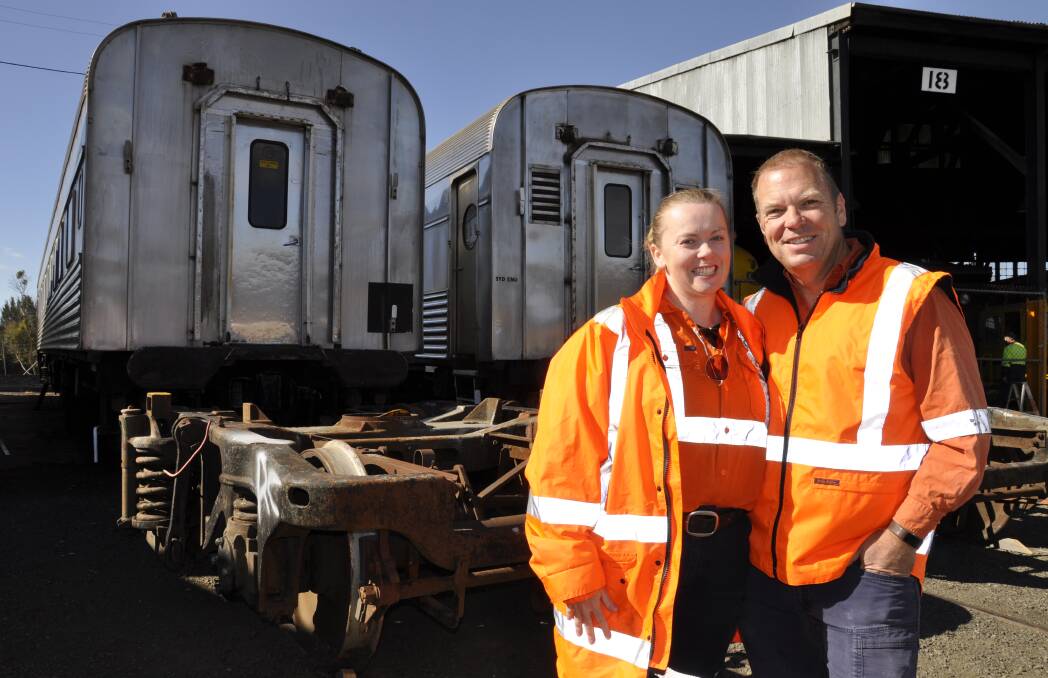 LABOUR OF LOVE: Canberra couple Danielle and Simon Mitchell are using Goulburn as a base to restore Southern Aurora train carriages for their rail tours. Photo: Louise Thrower.