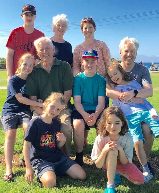 David Penalver (second right, centre) on his 80th birthday in May, 2019 with his wife Daphne (behind), daughter Marian Cain, son Adrian and grandchildren Alex Cain, twins Freya and Morgan Cain, Rory Cain and twins Charlotte and Louise Penalver. Photo supplied.