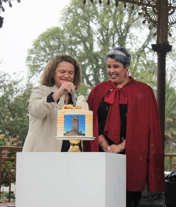 Doing the honours: Goulburn MP Wendy Tuckerman and Lilac Queen April Watson cut a cake to celebrate the city's 157th birthday on Saturday. Photo: Burney Wong.

