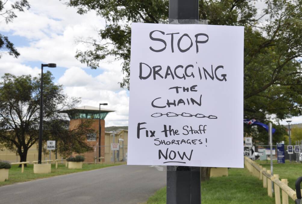 POINTED: Protesting officers posted signs around Goulburn Correctional Centre on Friday to get their message across.