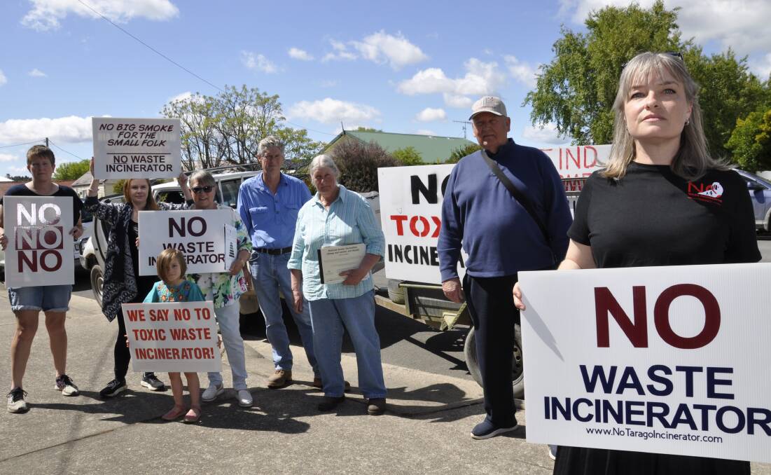 Communities Against the Tarago Incinerator member Paige Davis and other residents protested outside Veolia's information session in the town on Saturday. Picture by Louise Thrower.