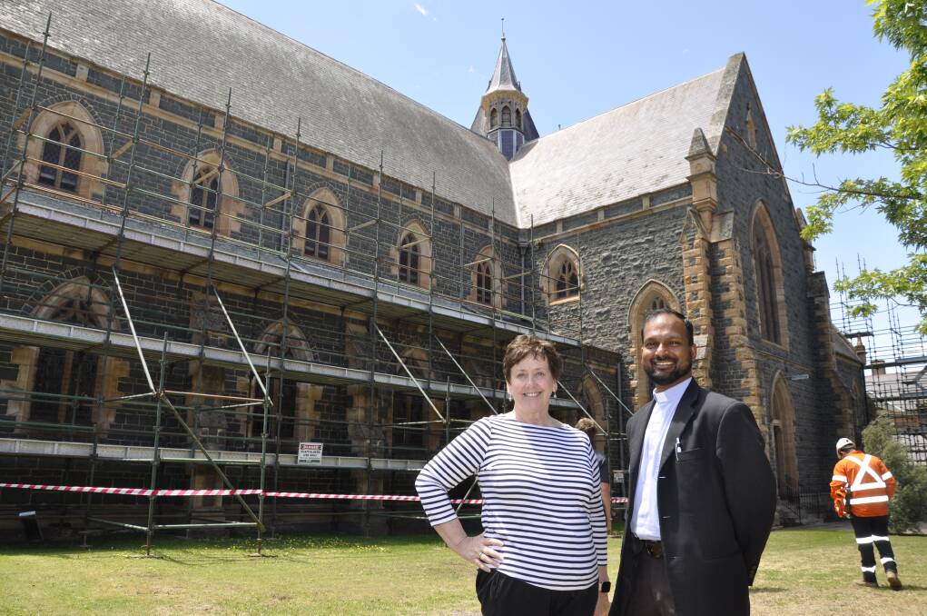 Sts Peter and Paul's cathedral restoration chair Dr Ursula Stephens and Mary Queen of Apostles parish priest, Father Joshy Kurien are pleased with the project's progress. Photo: Louise Thrower.