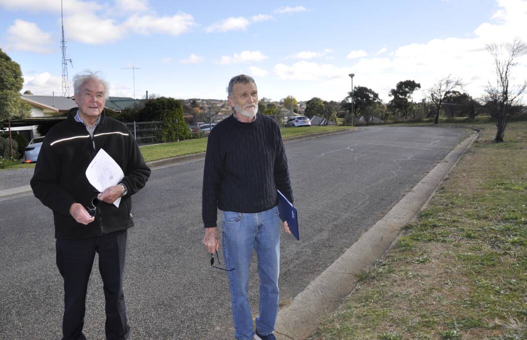 'DANGEROUS:' Hollis Avenue residents Rob Greenlees and Philip Fowler say a Salvation Army subdivision access on to the narrow and bending street will create a "death trap." They are calling on the council to revisit the approval. Photo: Louise Thrower.