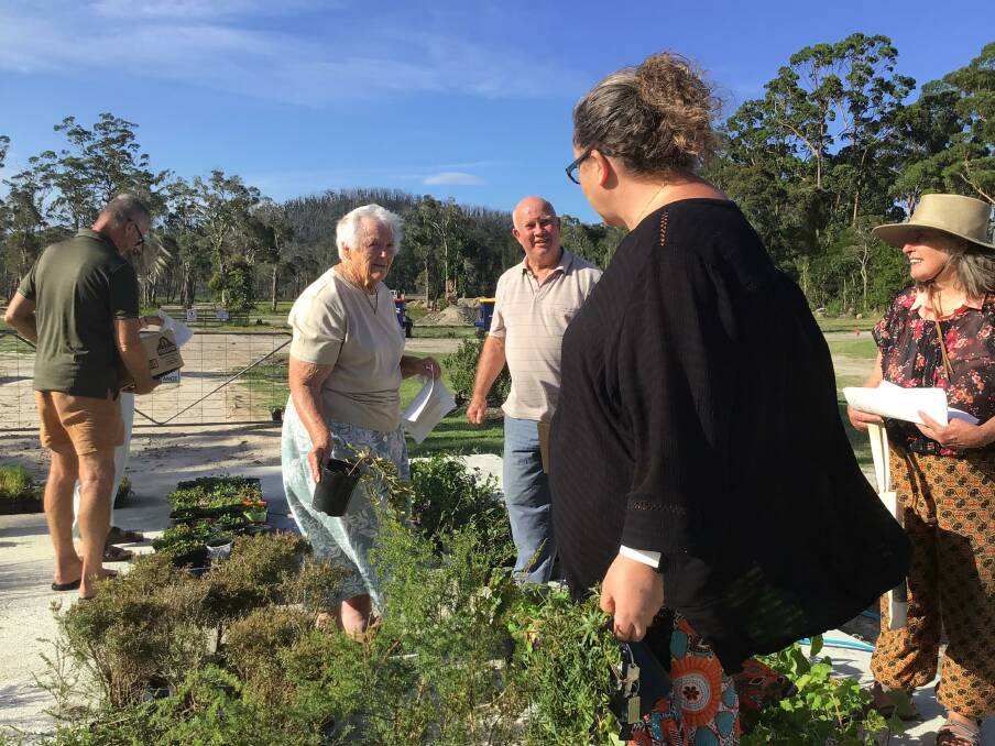 GOODWILL GESTURE: International Volunteers for Peace delivered a batch of plants to Lake Conjola to help with bushfire rehabilitation. Photo supplied.