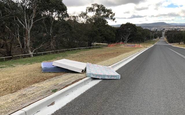 Mayor Bob Kirk snapped these mattresses dumped in western Mary Street on Wednesday morning. The mayor is encouraging the community to call-out rubbish dumpers.
