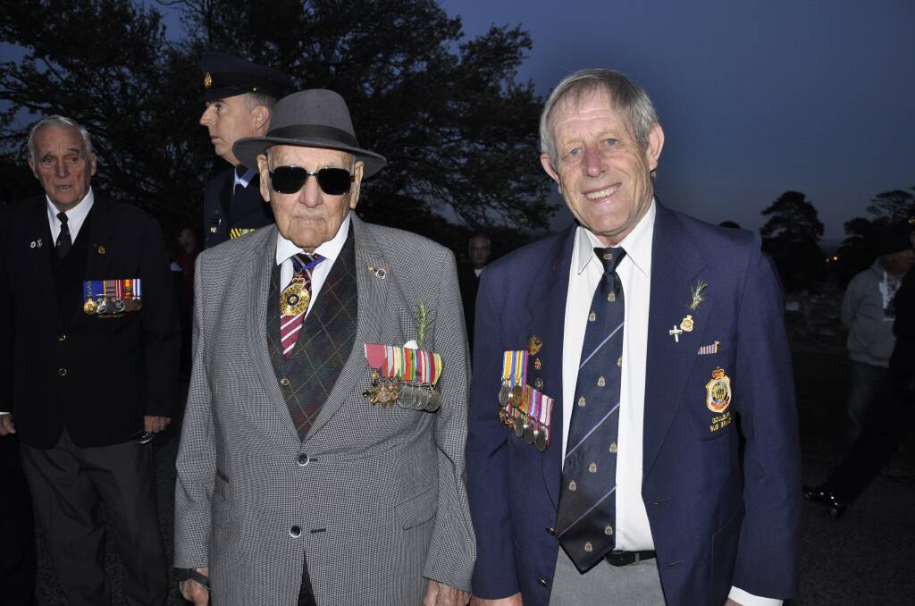REVERED: Goulburn RSL Sub Branch patron and World War Two veteran Peter Lloyd AO OBE with Sub Branch member Rod MacLean at the 2018 Anzac Day dawn service. Photo: Louise Thrower.