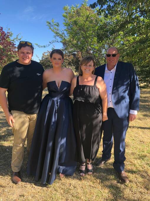 Jamie Buck (right) passed away on Friday night/Saturday morning. He was pictured in happy times with wife, Amanda, son, Joshua and daughter, Kaelisha. Photo supplied.