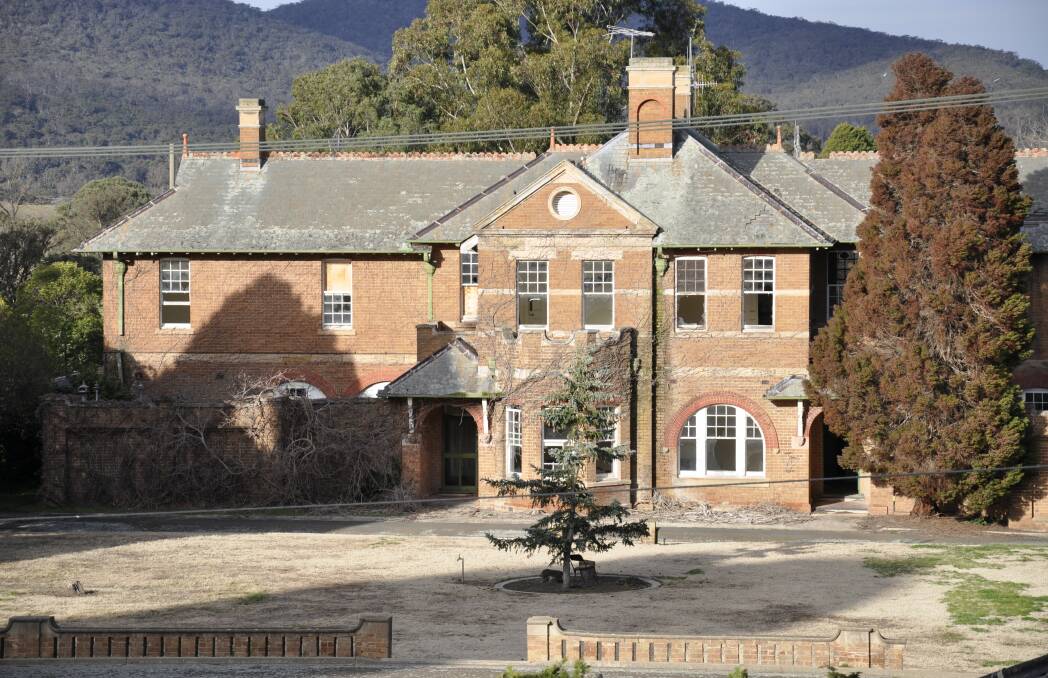 'NEGLECT': Kenmore's heritage has been wilfully disregarded by the owner, Goulburn MP Wendy Tuckerman says. This building near the complex's central core was photographed in August, 2020 and showed smashed windows. Photo supplied.