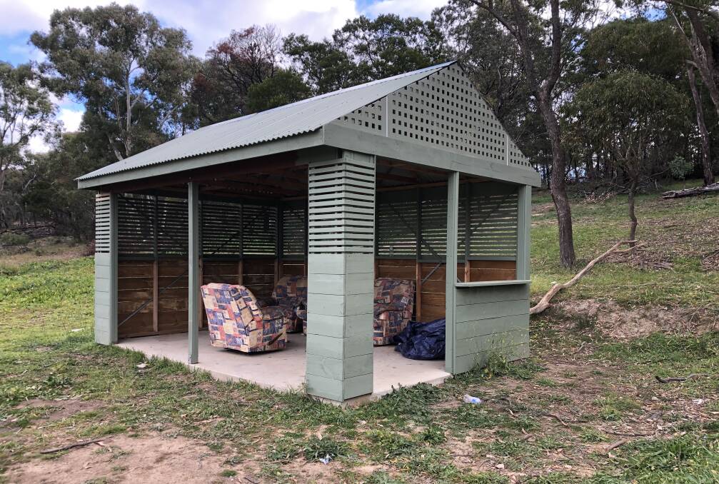 The shelter was built by West Goulburn Bushland Reserve volunteers in 2018. In 2020 vandals dumped furniture inside. Photo supplied.