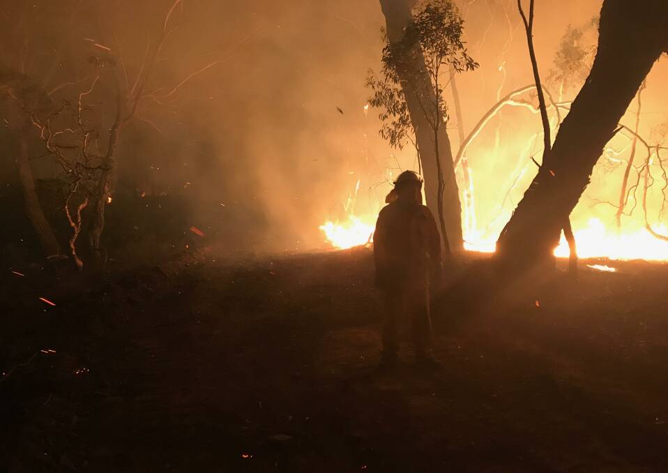 Divalls staff were involved in back-burning at Bungonia. Andy Divall is also a volunteer firefighter. Photo supplied.