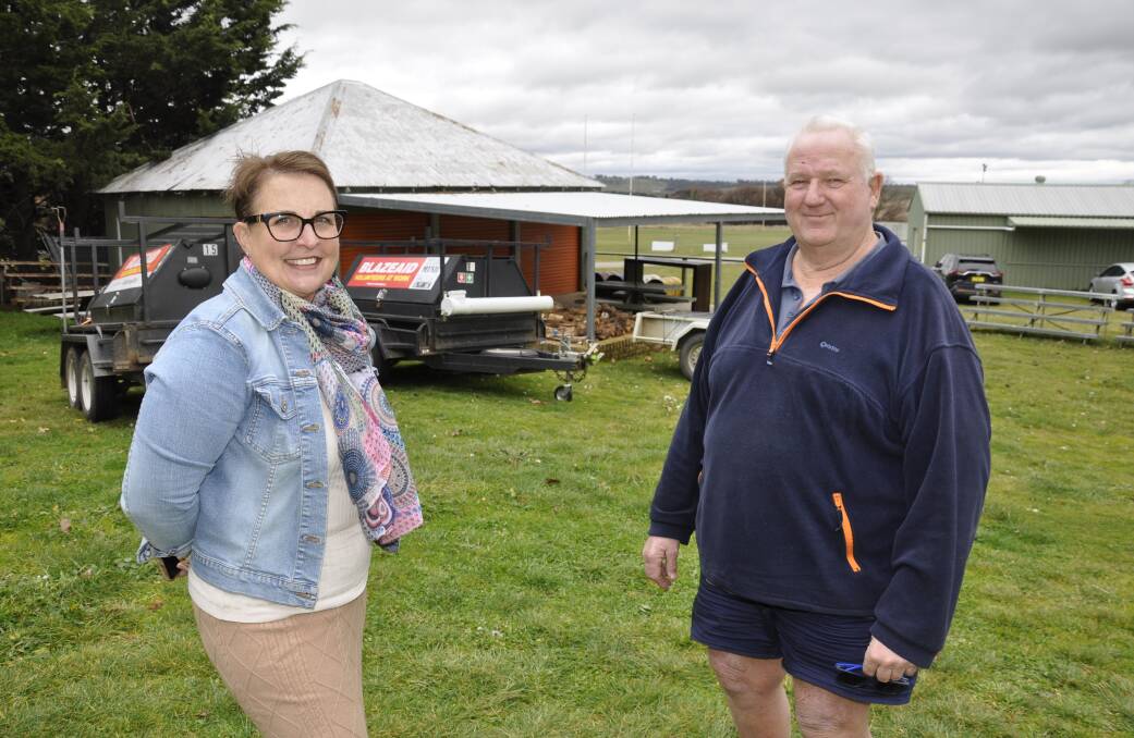 Upper Lachlan Shire councillor, Jo Marshall, dropped into the Taralga showground BlazeAid camp to meet its manager and volunteer, Mike Roberts, on Wednesday. Picture by Louise Thrower.