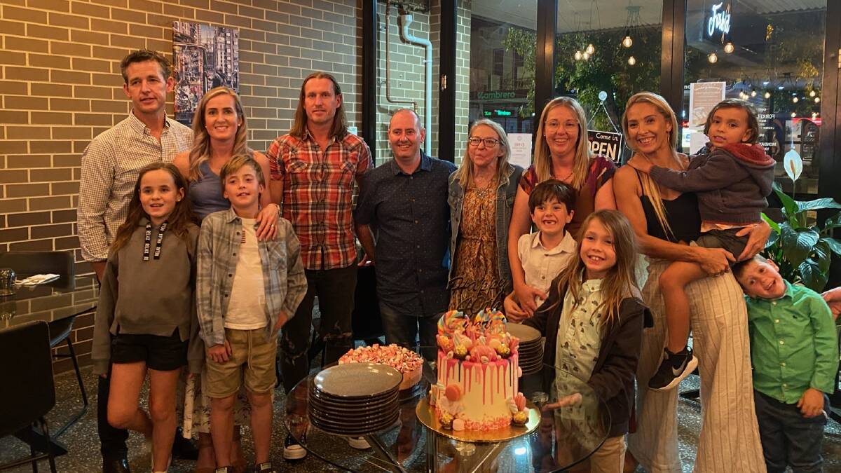 HAPPY TIMES: The family celebrated Sheridan's 40th birthday in March. L-r: Matthew and Melissa Charnock, Nick Mowle, Laurence and Sheridan Wood, Stephanie Mowle, Maria Mowle. The children are Annabelle, Harrison, Raphael, Sonny and Theodore. Photo supplied. 