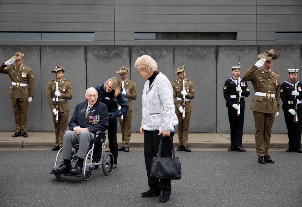 Lance Cooke and daughter, Rosalee, arrived at the Australian War Memorial service on Saturday to a guard of honour. Photo: Department of Veterans Affairs.