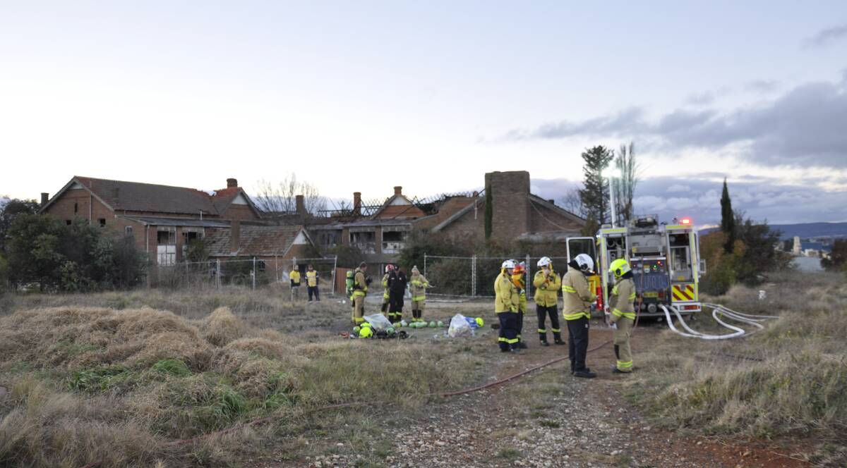 NSW Fire and Rescue and RFS crews attended a blaze in a rear caretaker's cottage at the former orphanage on Saturday, June 26. Photo: Louise Thrower.