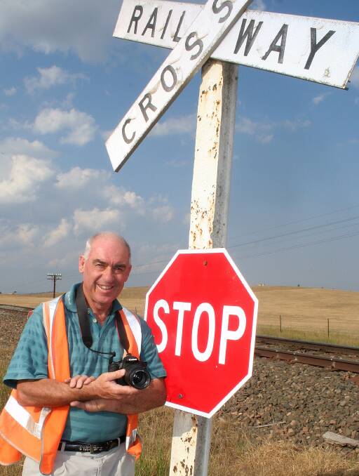 Longtime Goulburn Post photojournalist Leon Oberg has continued his passion for the craft in 'retirement'. The keen rail photographer and author has written many books, produced calendars and edited and written for several magazines. Photo: Charlie Elward. 