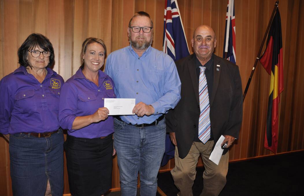 Holcim's Lynwood quarry manager Wayne Beattie and Mayor Peter Walker presented a cheque from the Holcim Mayoral Charity Golf Day to Goulburn Riding for Disabled president Kim Mahoney and secretary, Jo Grove. Picture by Louise Thrower. 