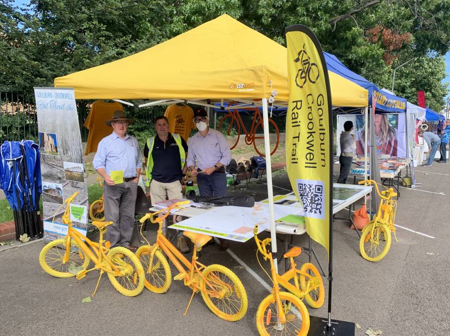 Proponents of the Goulburn to Crookwell rail trail, including Cr Bob Kirk (left) have promoted the project at the Rotary markets. Photo supplied. 