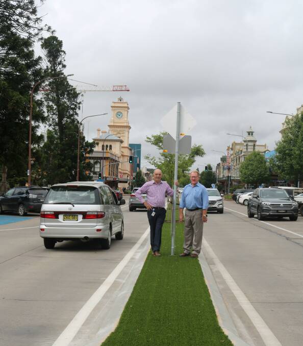 Council general manager Warick Bennett and former mayor Bob Kirk pictured in Auburn Street last year promoting the CBD beautification program. Phot supplied.