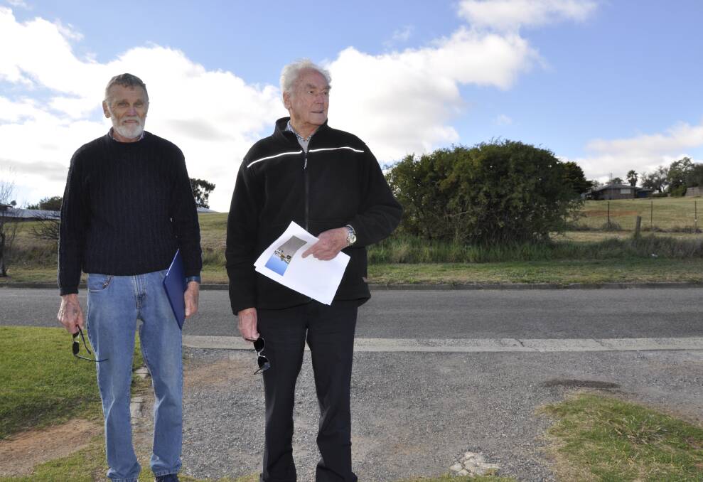 Philip Fowler and Rob Greenlees stand in Mr Greenlees' driveway, opposite which the subdivision access will be located. Photo: Louise Thrower.