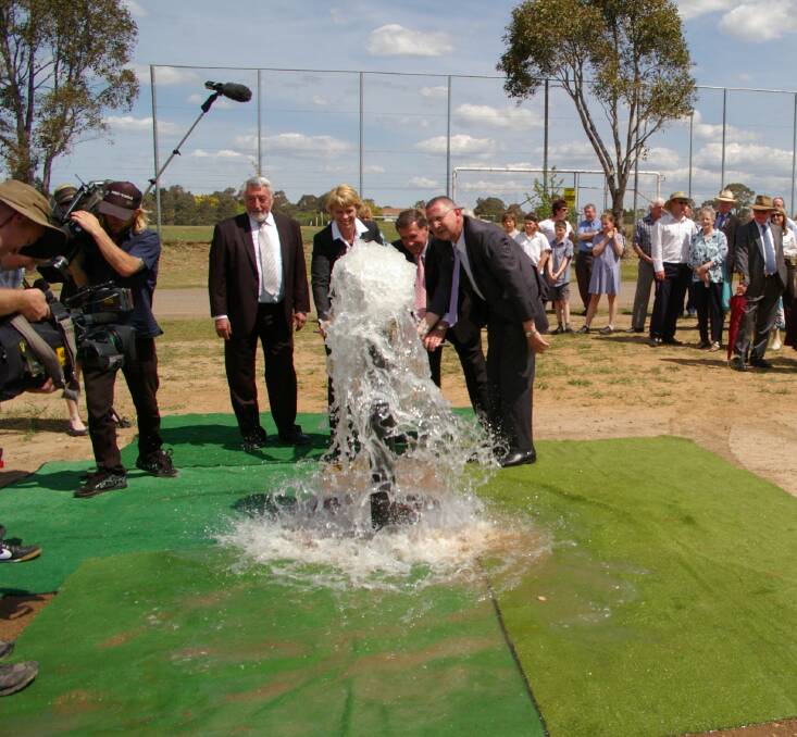 HISTORY: Former Goulburn Mulwaree Mayor Geoff Kettle opened the Highland Source pipeline in October, 2011 with Paul Stephenson and then Minister Katrina Hodgkinson. Photo: Darryl Fernance.