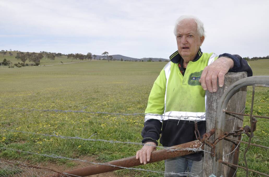 ACT NOW: George Gildea says the high pressure gasline running behind him on his Middle Arm Road property is 47 years old and a public safety risk. Photo: Louise Thrower. 