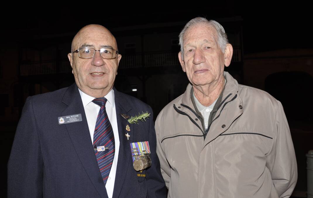 Goulburn RSL Sub Branch secretary Mal Ritchie and treasurer Keith Weston at last year's ANZAC Day dawn service. 