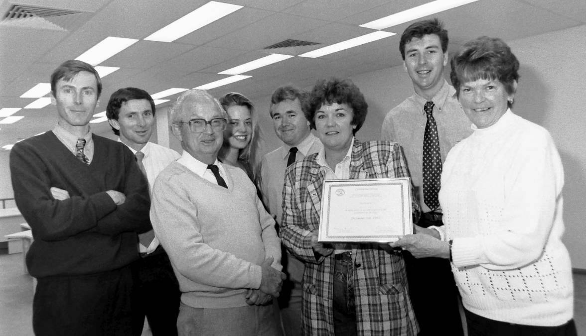 GREAT TEAM: Chris Gordon (rear second right) was part of a vibrant and fun newsroom in the 1990s that included Mark Filmer, Ian Frazer, Ray Williams, Vanessa Barden, Chris Ward and deputy editor Maree Bensley. They were pictured with Mayor Pat Fairall. Photo supplied.