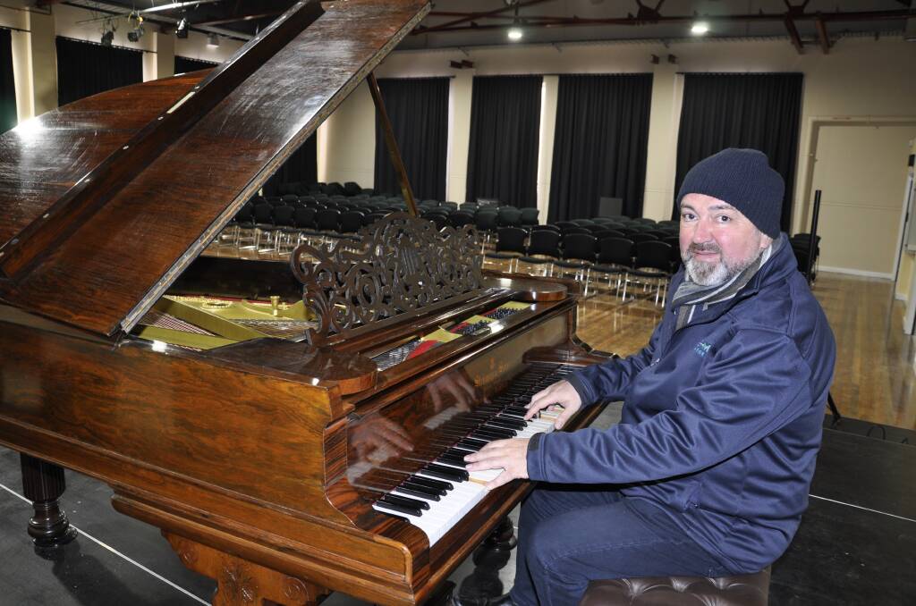 Accomplished pianist Paul Scott-Williams practices in the refurbished auditorium of the Con's Creative Arts Precinct. He is playing a 160-year-old Steinway piano once used in ABC concerts. It was donated to the Con by a Southern Highlands family. Photo: Louise Thrower. 