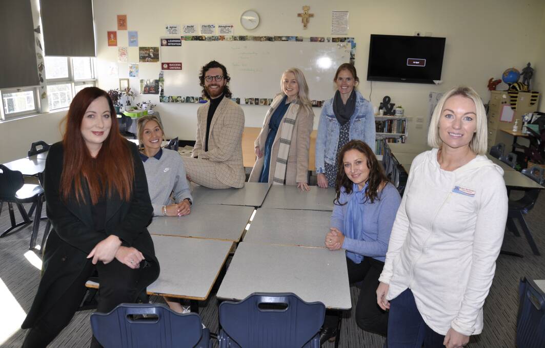 Trinity Catholic College acting principal Lauren Shinfield with the new catholic school teachers Mikayla Cook, Zac Bladwell, poppy Perry, Emma Huggett, Angela Ashley-Jones and Esther MacGregor. Picture by Louise Thrower. 