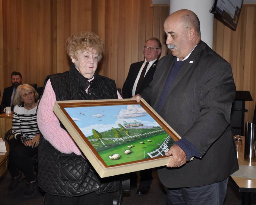 PROUD: Margaret O'Neill OAM was pleasantly surprised by Mayor Peter Walker's gift, presented on behalf of Shibetsu Council. It acknowledged her role in establishing the Goulburn-Shibetsu sister-city relationship. Photo: Louise Thrower.
