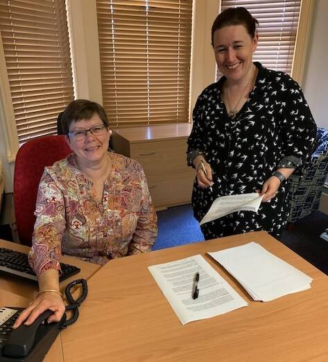 HERE TO HELP: Anglicare's regional manager, Toni Reay (right) discusses the specialised program to help problem gamblers and their family with financial counselling coordinator Donna Sykes. Photo supplied.