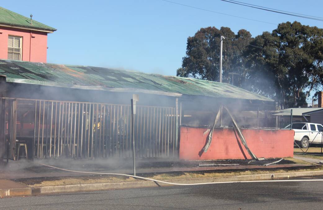 A rear shed also sustained damage in the fire. Photo: Burney Wong.