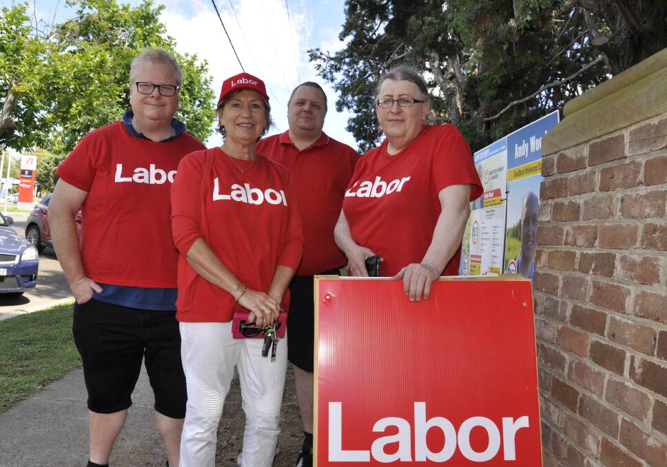 Labor Party ticket members Jason Shepherd, Anna Wurth-Crawford, Nathan Smith and Danielle Marsden- Ballard at the Wesley Centre booth on Saturday. Photo: Louise Thrower.
