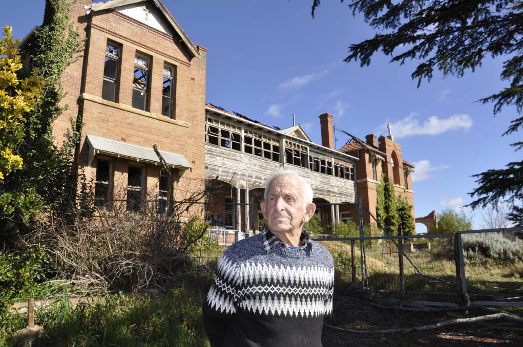 REFLECTIONS: Alan Gilroy accepted his childhood at the former Saint John's orphanage after being sent there as a young child. Now he says it should be demolished and redeveloped into something of benefit for the city. Photo: Louise Thrower. 