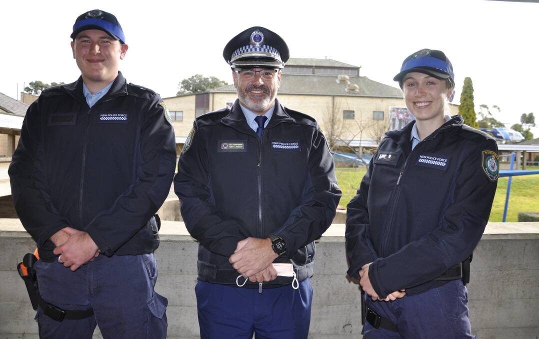 'HERE TO STAY': Goulburn Police Academy principal, Chief Superintendent Toby Lindsay (centre) with students Grayson Thomas and Nadienne Roffey who will attest this month. Photo: Louise Thrower.