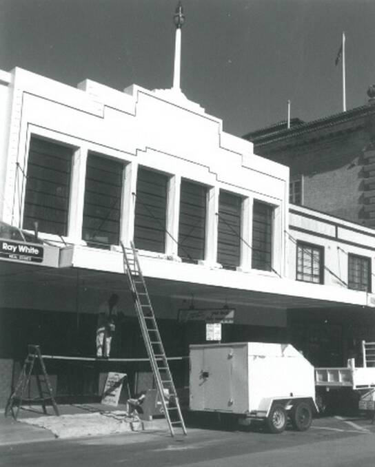 SPRUCE UP: Painters went to work as part of the 1993 restoration. Photo: Goulburn Post archives.