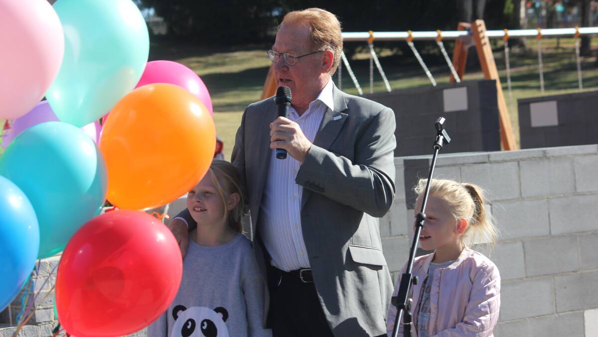 Mayor Bob Kirk (pictured with his grandchildren at last year's Adventure Playground opening in Victoria Park) said he couldn't perform the role without the support of his wife and family. Photo: Mariam Koslay