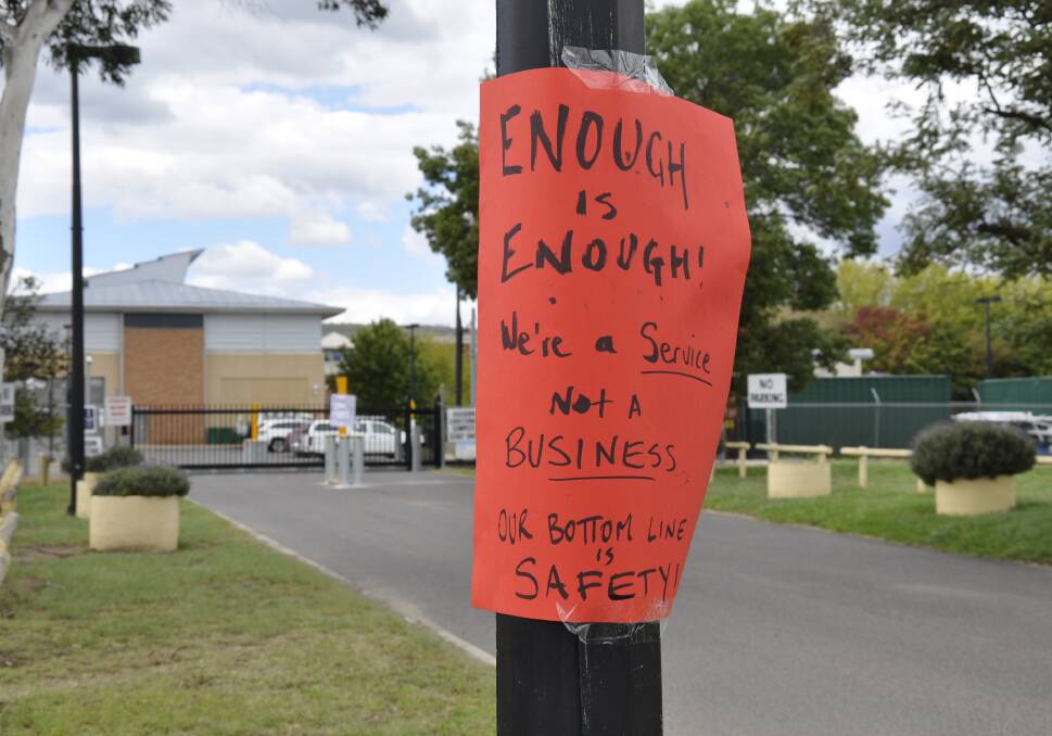 Prison officers placed posters around Goulburn Correctional Centre as part of their protest.