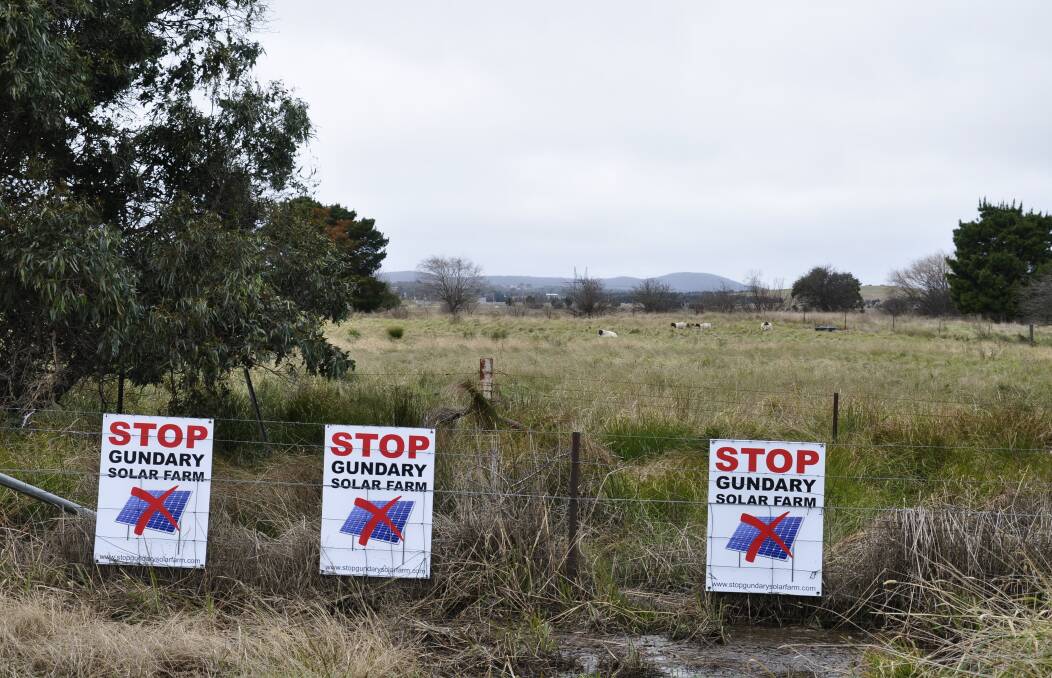 Landowners say activists, including a member of The Goulburn Group, have stolen their signs mounted on fencing against the Gundary Solar Farm. They have since been re-posted. Photo: Louise Thrower.