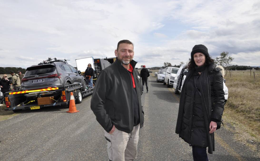 Hyundai head of brand, product and retail, Alex Pinsuti and Sarah Gardan from Sydney-based advertising agency, Innocean, on set at Windellama Road on Thursday for the car commercial. Picture by Louise Thrower. 