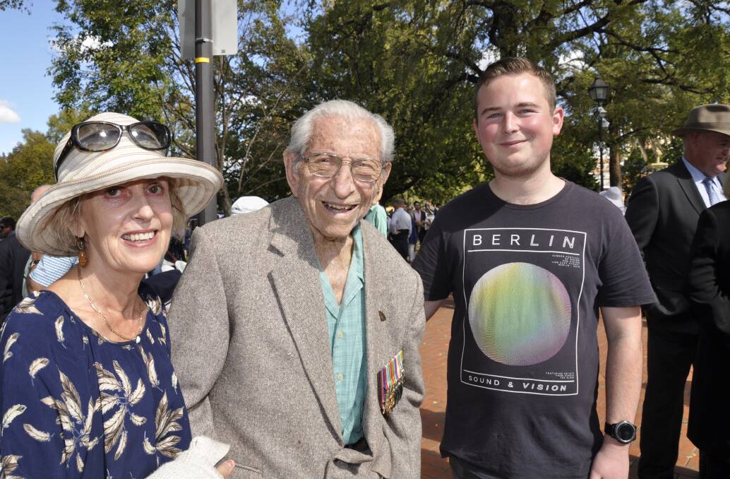 HONOURING MATES: One of Goulburn's oldest war veterans, 98-year-old Peter Allen never misses an Anzac Day march. He is pictured here with friend Carol Stampton and her grandson Ryan Stampton at the 2019 commemoration. Photos: Louise Thrower.
