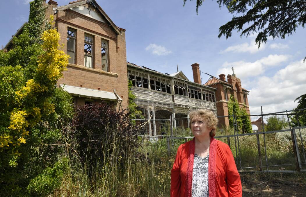 'NO HERITAGE LEFT:' Neighbour of the former Saint John's Orphanage building, Carolyn Clancy, says she's relieved the structure will soon be demolished, given the fire and safety risks. Photo: Louise Thrower.