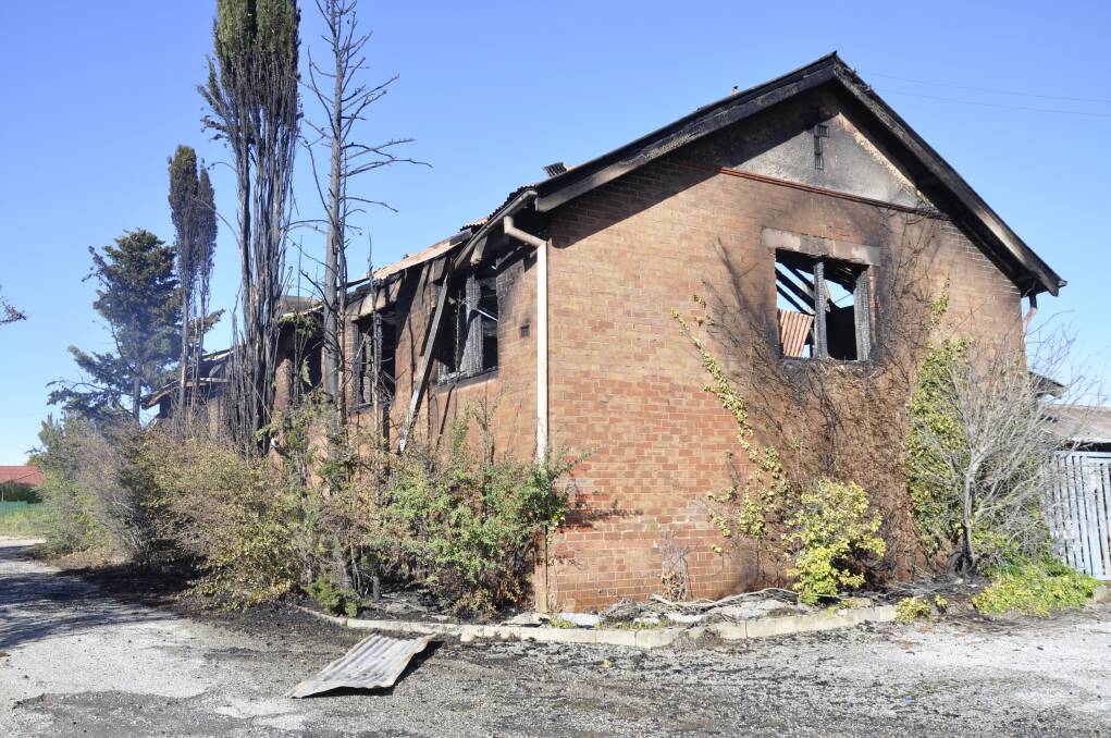 GUTTED: Firefighters took nearly three hours to extinguish the fire at the rear of St John's orphanage on Monday.