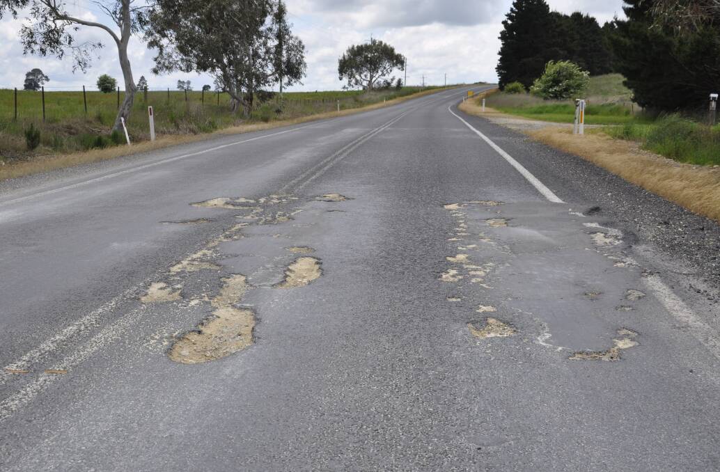 Potholes are rampant on Braidwood Road. The road is maintained by Queanbeyan Palerang Shire Council under a state government contract. Picture by Louise thrower.