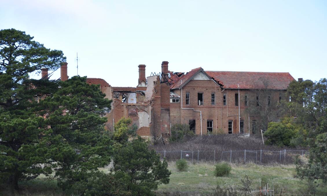 The severely fire-damaged former Saint John's orphanage is highly visible and "a blight on the landscape," says Mayor Bob Kirk. Photo: Louise Thrower.
