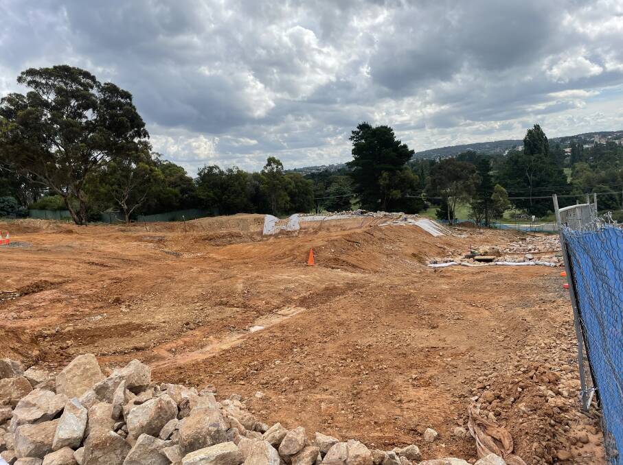 CONTENTIOUS: Land on the corner of May and Chiswick Streets, below Rocky Hill, was cleared of vegetation last year in readiness for a 27-lot subdivision. The council is taking the company to court over alleged pollution and non-compliance issues. Photo: Louise Thrower.