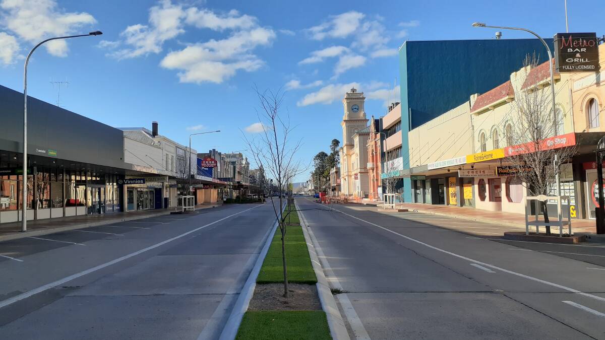 BARE: A block in Goulburn's main street was virtually empty of parked cars on Sunday at a time when people would normally be patronising The Paragon Cafe, the Hibernian Hotel or doing general shopping. Photo: Louise Thrower.