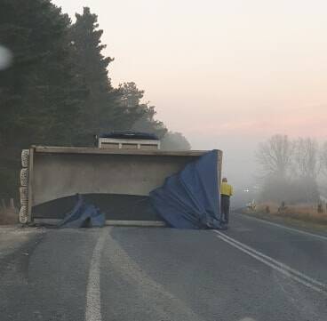 The dog trailer blocked the Braidwood Road's southbound lane after it tipped. Photo: Reece Warnecke.